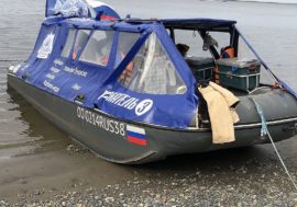 Travelers arrived in Dudinka on motorized inflatable boat