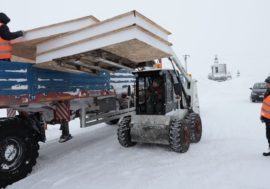 Nornickel cars with residential buildings sets left for Taimyr villages