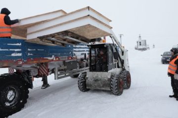 Nornickel cars with residential buildings sets left for Taimyr villages