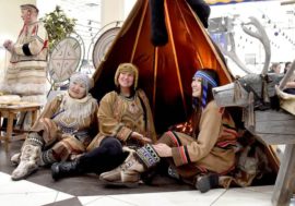 Game with hare skull and defile in national clothes
